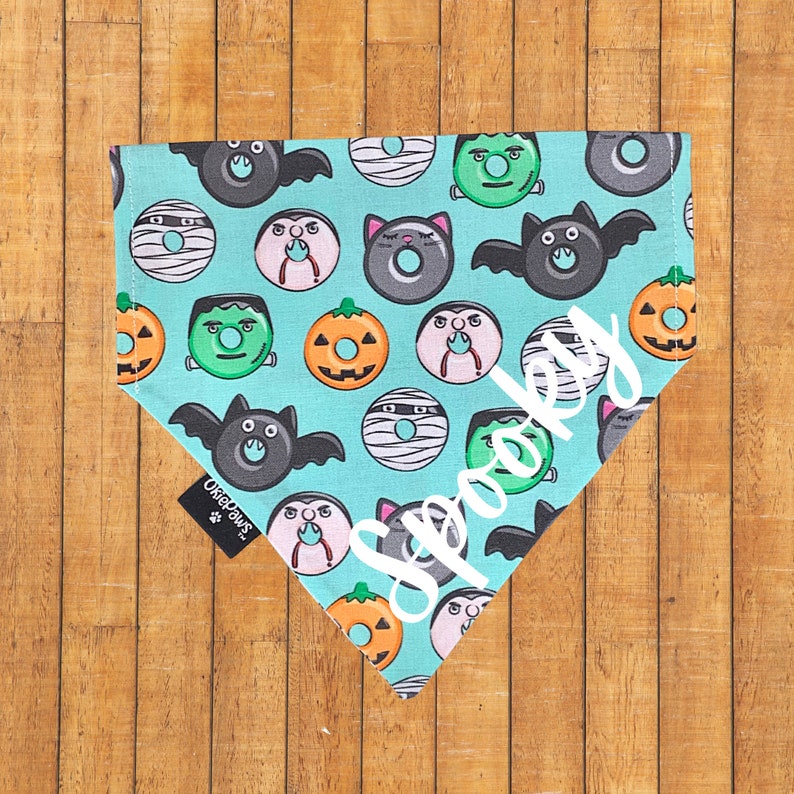 Blue dog bandana with cute donut Halloween monsters